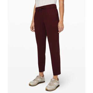 Lululemon On the Fly 7/8 Pant Garnet Purple Maroon Athleisure Athletic Casual 6
